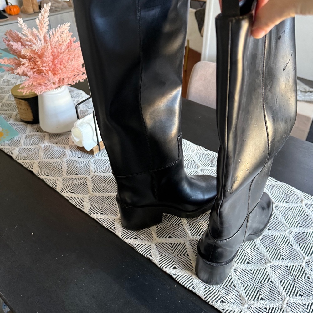 Knee high black boots